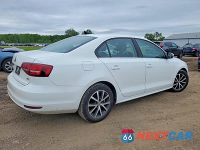 Trzecie zdjęcie samochodu z tyłu: 2017 VOLKSWAGEN JETTA VIN:3VWDB7AJXHM262738 - miniatura