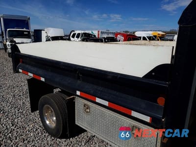 Zdjęcie 10 z 12 samochodu: 1999 FORD F350 SUPER DUTY DUMP TRUCK VIN:1FDWF37FXXEC62430 - miniatura