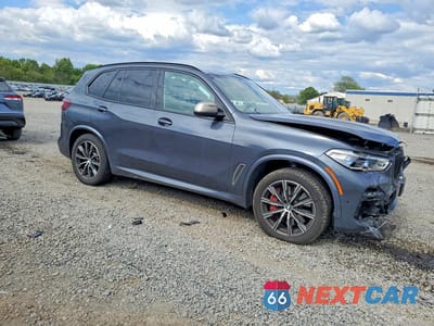 Czwarte zdjęcie samochodu z boku: 2022 BMW X5 M50I VIN:5UXJU4C0XN9J12186 - miniatura