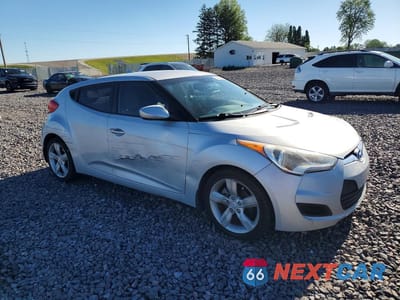 Czwarte zdjęcie samochodu z boku: 2012 HYUNDAI VELOSTER BASE VIN:KMHTC6AD8CU065552 - miniatura