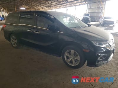 Czwarte zdjęcie samochodu z boku: 2018 HONDA ODYSSEY EXL VIN:5FNRL6H7XJB064987 - miniatura