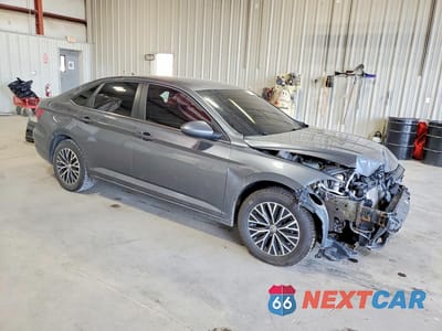 Czwarte zdjęcie samochodu z boku: 2021 VOLKSWAGEN JETTA S VIN:3VWC57BU4MM017889 - miniatura