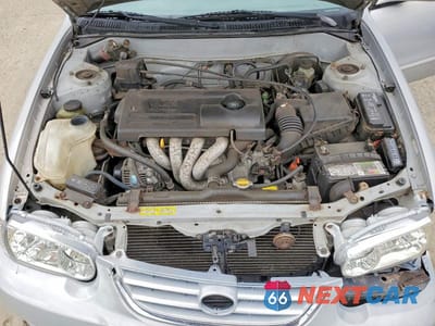 Zdjęcie 11 z 12 samochodu: 2002 TOYOTA COROLLA LE VIN:2T1BR18E82C574147 - miniatura