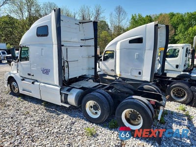 Trzecie zdjęcie samochodu z tyłu: 2014 VOLVO VNL SEMI TRUCK VIN:4V4NC9EH2EN170696 - miniatura