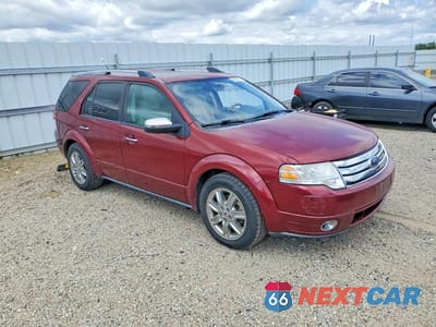 Czwarte zdjęcie samochodu z boku: 2008 FORD TAURUS X LIMITED VIN:1FMDK06W18GA13328 - miniatura