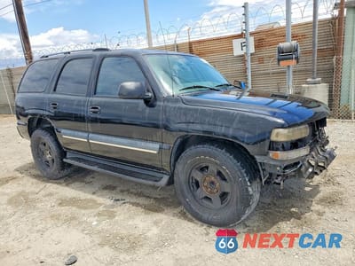 Czwarte zdjęcie samochodu z boku: 2004 CHEVROLET TAHOE C1500 VIN:1GNEC13V04R191860 - miniatura