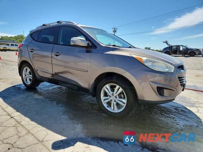 Czwarte zdjęcie samochodu z boku: 2012 HYUNDAI TUCSON GLS VIN:KM8JU3AC9CU499084 - miniatura