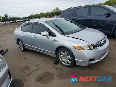 Czwarte zdjęcie samochodu z boku: 2009 HONDA CIVIC LX VIN:2HGFA16549H331688 - miniatura