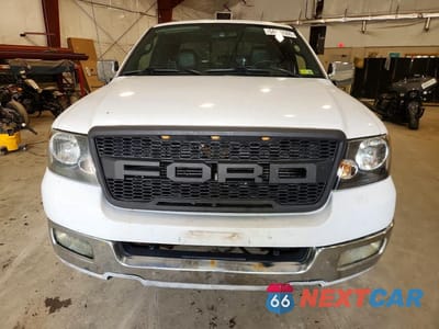 Piąte zdjęcie samochodu w środku: 2004 FORD F150 VIN:1FTPX12534NB67521 - miniatura