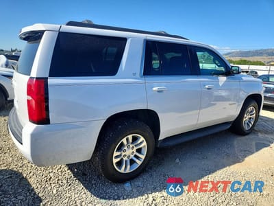 Trzecie zdjęcie samochodu z tyłu: 2019 CHEVROLET TAHOE C1500 VIN:1GNSKBKC3KR223161 - miniatura