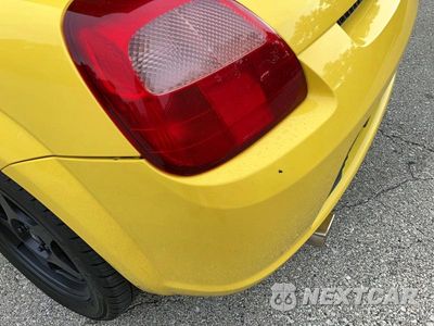 Zdjęcie 14 z 14 samochodu: 2001 TOYOTA MR2 SPYDER VIN:JTDFR320X10033944 - miniatura