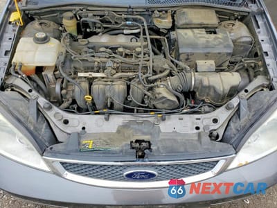Zdjęcie 11 z 12 samochodu: 2005 FORD FOCUS ZX5 VIN:3FAFP37N25R146759 - miniatura