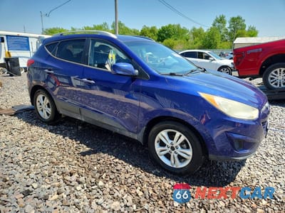 Czwarte zdjęcie samochodu z boku: 2011 HYUNDAI TUCSON GLS VIN:KM8JU3AC7BU171077 - miniatura
