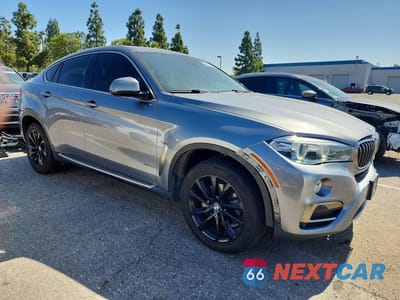 Czwarte zdjęcie samochodu z boku: 2018 BMW X6 XDRIVE35I VIN:5UXKU2C57J0X49569 - miniatura