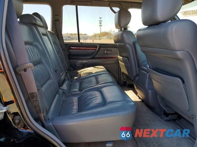 Zdjęcie 11 z 13 samochodu: 2002 LEXUS LX 470 VIN:JTJHT00W323519525 - miniatura