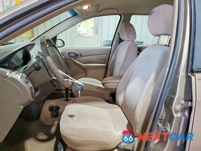 Zdjęcie 7 z 12 samochodu: 2003 FORD FOCUS SE VIN:1FAFP36373W129949 - miniatura