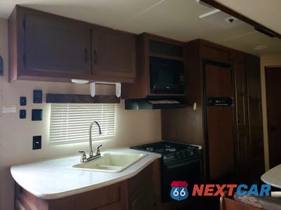 Zdjęcie 8 z 10 samochodu: 2015 JAYCO JAY FLIGHT SLX CAMPER VIN:1UJBJ0BR0F77X0085 - miniatura