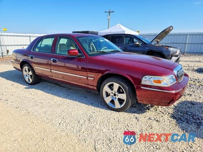 Czwarte zdjęcie samochodu z boku: 2009 MERCURY GRAND MARQUIS LS VIN:2MEHM75V29X614551 - miniatura