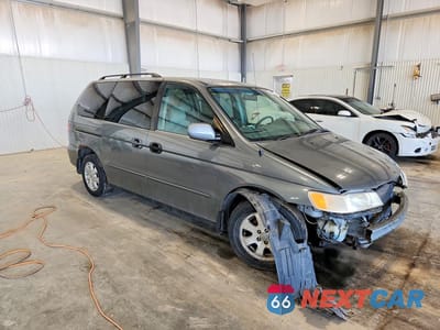 Czwarte zdjęcie samochodu z boku: 2001 HONDA ODYSSEY EX VIN:2HKRL18631H504088 - miniatura
