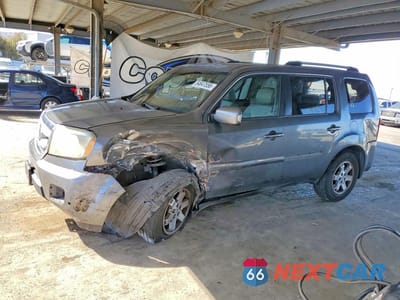 2011 HONDA PILOT TOURING 5FNYF4H98BB009089 - główne zdjęcie licytacji z USA - miniatura