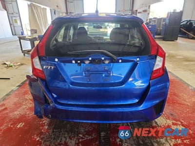 Zdjęcie 6 z 12 samochodu: 2017 HONDA FIT LX VIN:JHMGK5H54HS016903 - miniatura