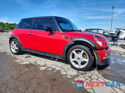 Czwarte zdjęcie samochodu z boku: 2004 MINI COOPER VIN:WMWRC33404TJ57608 - miniatura