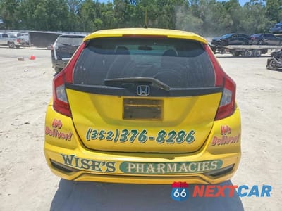 Zdjęcie 6 z 14 samochodu: 2019 HONDA FIT LX VIN:3HGGK5H49KM702848 - miniatura
