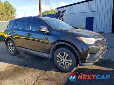 Czwarte zdjęcie samochodu z boku: 2018 TOYOTA RAV4 LE VIN:2T3BFREV8JW741347 - miniatura