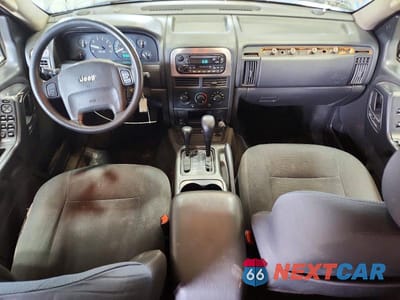 Zdjęcie 8 z 13 samochodu: 2004 JEEP GRAND CHEROKEE LAREDO VIN:1J4GW48S44C125012 - miniatura