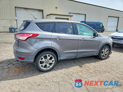 Trzecie zdjęcie samochodu z tyłu: 2013 FORD ESCAPE SEL VIN:1FMCU9H90DUC87682 - miniatura
