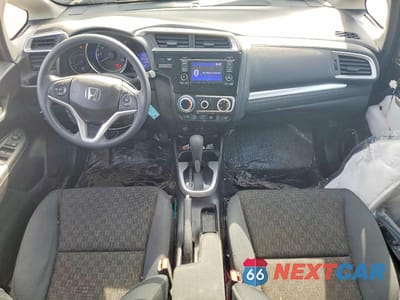Zdjęcie 8 z 13 samochodu: 2016 HONDA FIT LX VIN:JHMGK5H50GX003650 - miniatura
