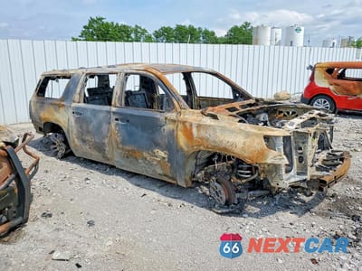 Czwarte zdjęcie samochodu z boku: 2018 CHEVROLET SUBURBAN K1500 LT VIN:1GNSKHKC5JR142437 - miniatura