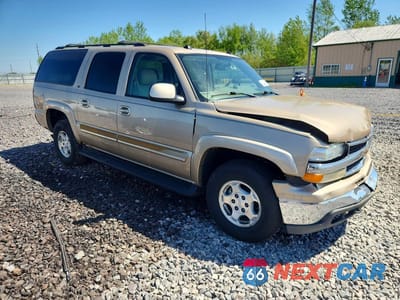 Czwarte zdjęcie samochodu z boku: 2004 CHEVROLET SUBURBAN K1500 VIN:1GNFK16Z34J293240 - miniatura