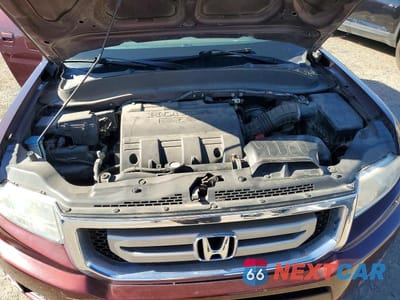 Zdjęcie 11 z 12 samochodu: 2011 HONDA RIDGELINE RTS VIN:5FPYK1F41BB010965 - miniatura