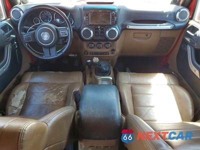 Zdjęcie 8 z 13 samochodu: 2012 JEEP WRANGLER UNLIMITED RUBICON VIN:1C4HJWFG0CL100108 - miniatura