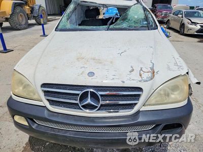 Zdjęcie 12 z 12 samochodu: 2004 MERCEDES-BENZ ML 500 VIN:4JGAB75E34A461670 - miniatura