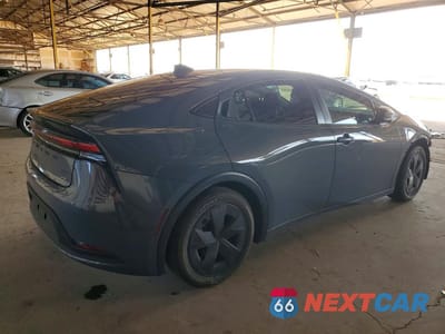 Trzecie zdjęcie samochodu z tyłu: 2024 TOYOTA PRIUS LE VIN:JTDACAAUXR3016527 - miniatura