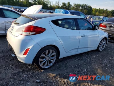 Trzecie zdjęcie samochodu z tyłu: 2013 HYUNDAI VELOSTER BASE VIN:KMHTC6AD9DU161255 - miniatura