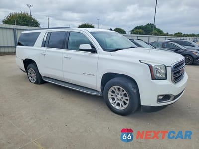 Czwarte zdjęcie samochodu z boku: 2015 GMC YUKON XL K1500 SLT VIN:1GKS2HKC0FR158615 - miniatura
