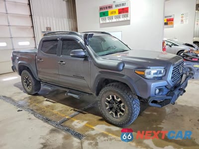 Czwarte zdjęcie samochodu z boku: 2020 TOYOTA TACOMA TRD OFF-ROAD VIN:3TYCZ5AN3LT005046 - miniatura