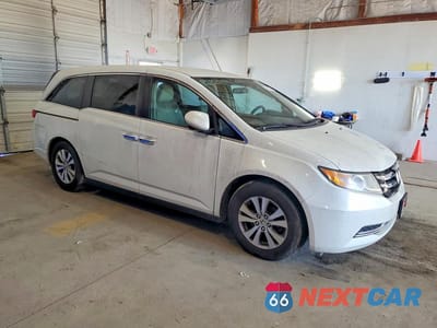 Czwarte zdjęcie samochodu z boku: 2017 HONDA ODYSSEY SE VIN:5FNRL5H34HB012188 - miniatura