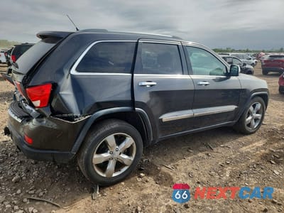 Trzecie zdjęcie samochodu z tyłu: 2011 JEEP GRAND CHEROKEE OVERLAND VIN:1J4RR6GT1BC607570 - miniatura