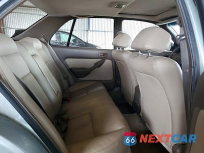 Zdjęcie 10 z 12 samochodu: 1994 TOYOTA CAMRY XLE VIN:JT2GK13E0R0020339 - miniatura