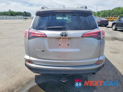 Zdjęcie 6 z 13 samochodu: 2018 TOYOTA RAV4 LE VIN:JTMZFREV7JD127319 - miniatura