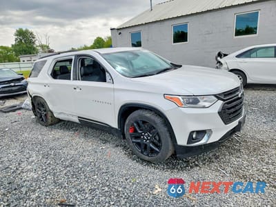 Czwarte zdjęcie samochodu z boku: 2018 CHEVROLET TRAVERSE PREMIER VIN:1GNEVJKW1JJ157876 - miniatura