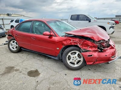 Czwarte zdjęcie samochodu z boku: 1999 FORD TAURUS SE VIN:1FAFP53SXXG307392 - miniatura