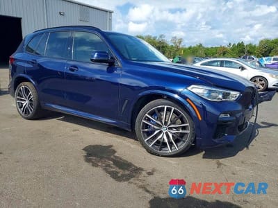Czwarte zdjęcie samochodu z boku: 2020 BMW X5 M50I VIN:5UXJU4C09L9D33200 - miniatura