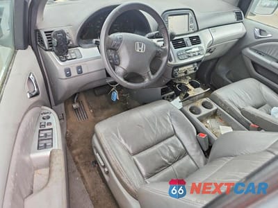 Zdjęcie 8 z 12 samochodu: 2010 HONDA ODYSSEY EXL VIN:5FNRL3H71AB078923 - miniatura
