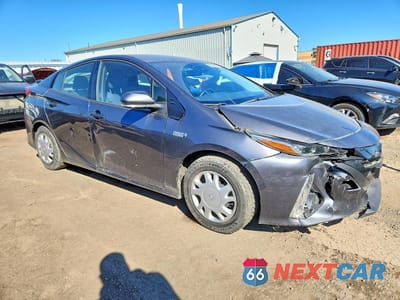 Czwarte zdjęcie samochodu z boku: 2021 TOYOTA PRIUS PRIME LE VIN:JTDKAMFP5M3164656 - miniatura