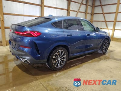 Trzecie zdjęcie samochodu z tyłu: 2021 BMW X6 XDRIVE40I VIN:5UXCY6C04M9G69704 - miniatura